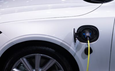 The Challenges and Opportunities of Electric Vehicle Adoption in Rural America: Paving the Way to a Greener Heartland  